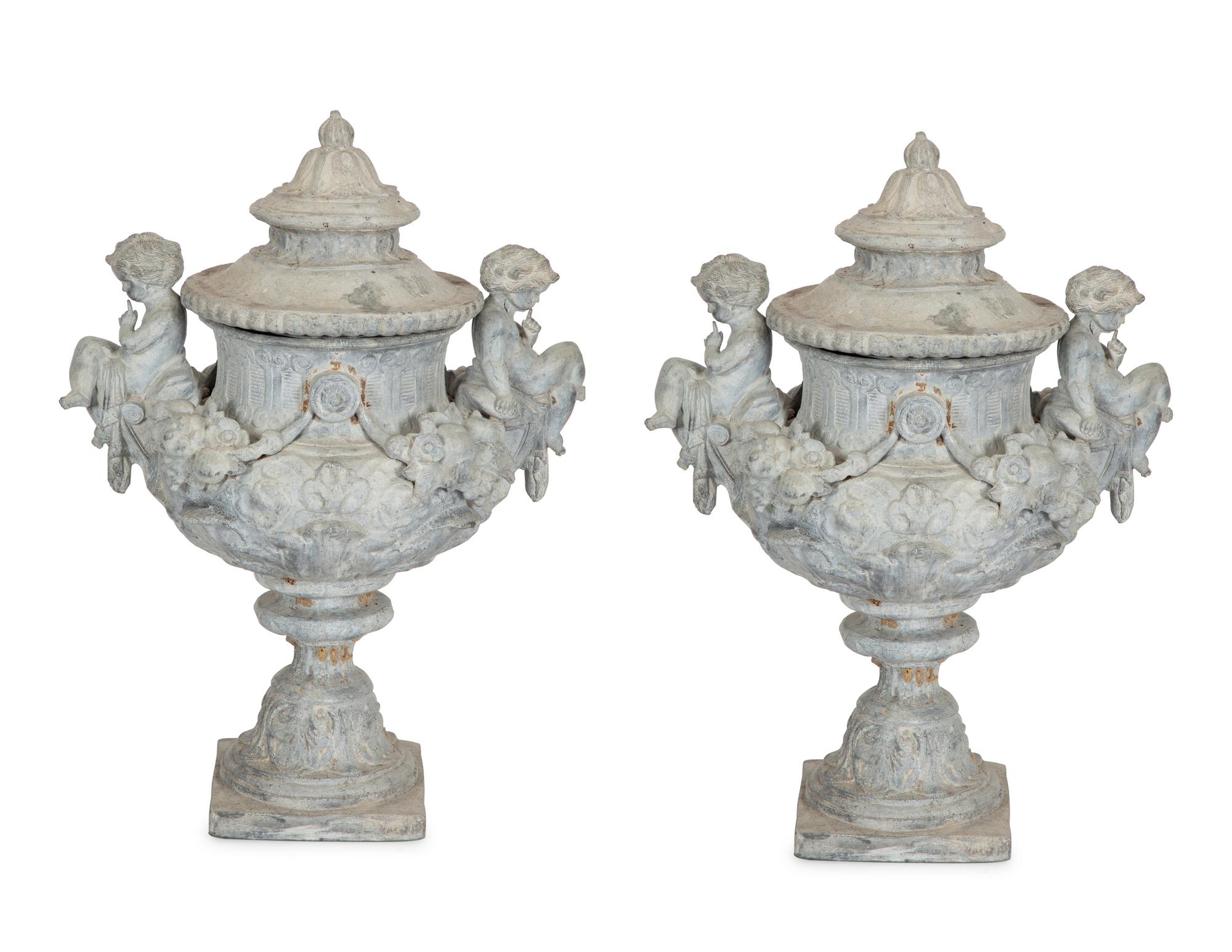 A Pair of Classical Style Cast Stone Covered Urns