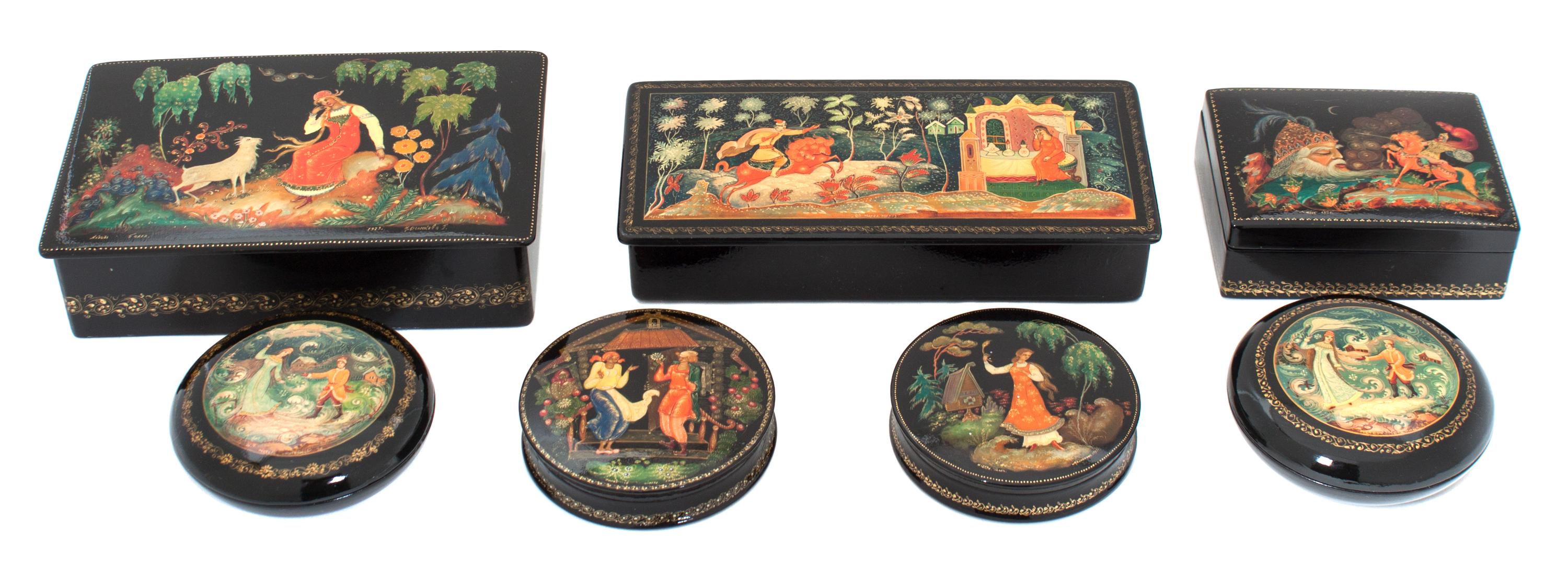 Seven Russian Lacquered Boxes Length of largest 7 x width 4 1/4 inches.