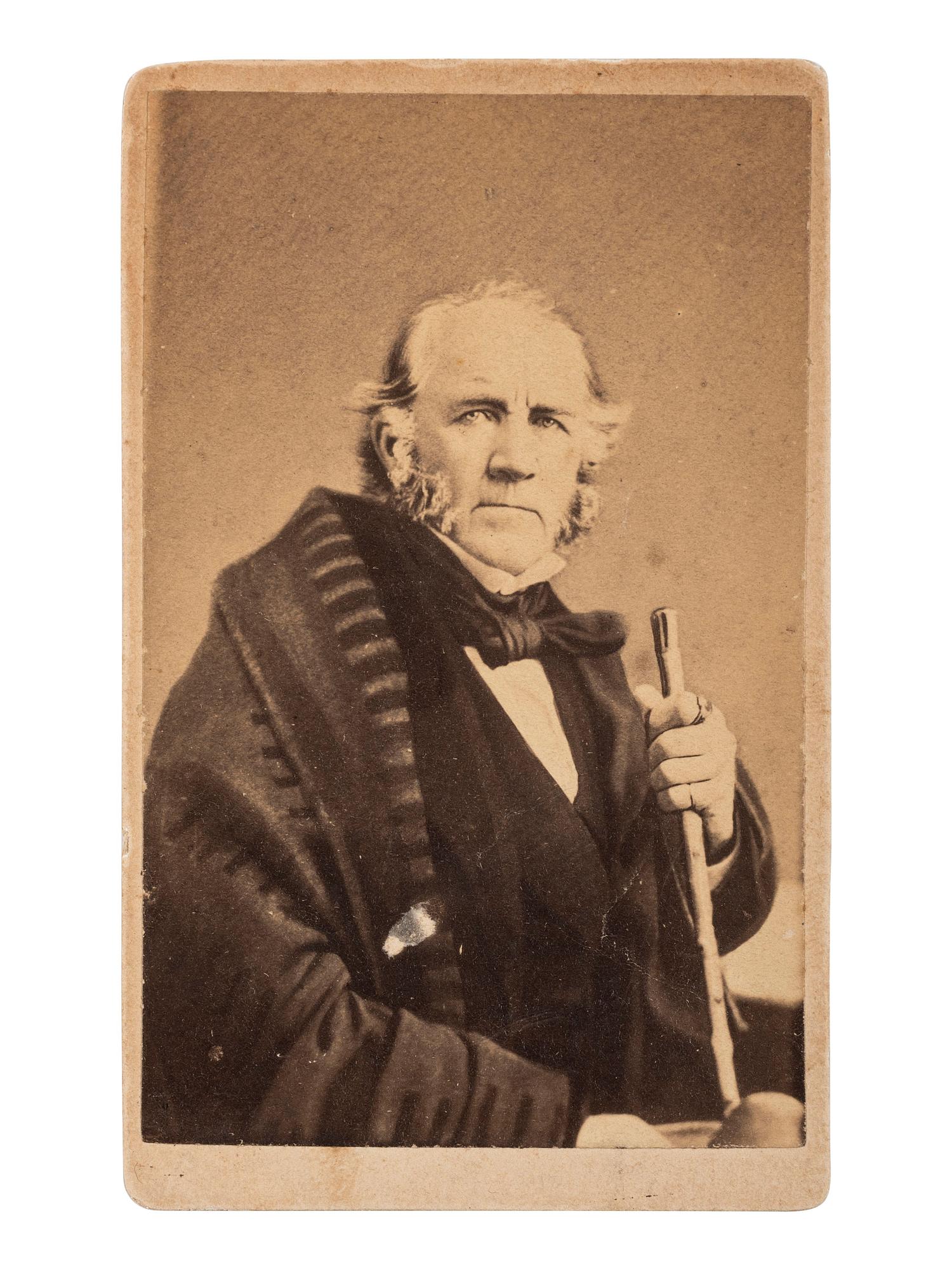 [TEXAS -- HOUSTON, Sam (1793-1863)]. CDV of General Houston seated with cane. N.p., ca 1860.