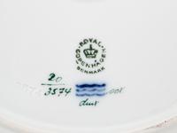 A Set of Fourteen Royal Copenhagen Flora Danica Dinner Plates