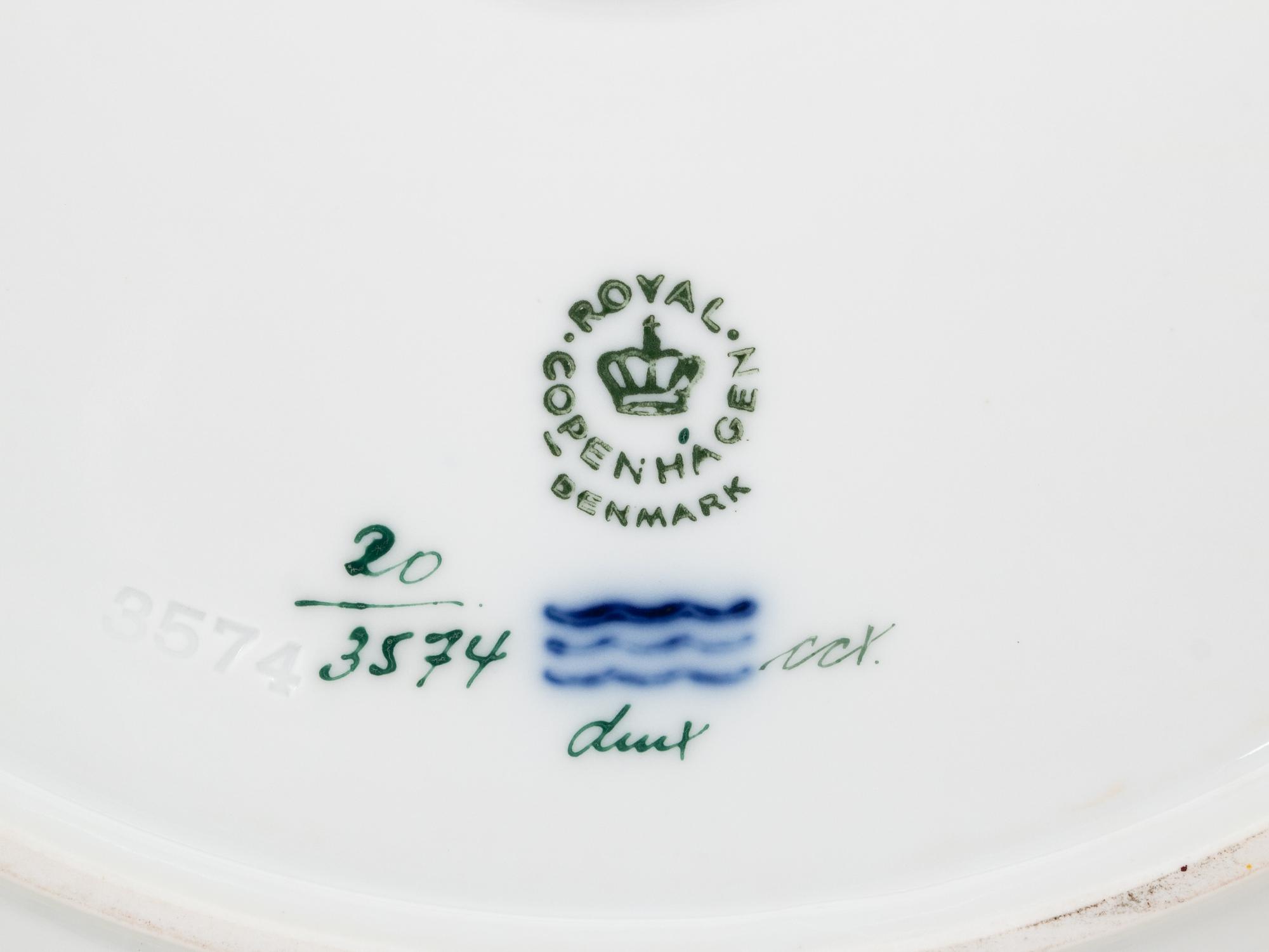 A Set of Fourteen Royal Copenhagen Flora Danica Dinner Plates