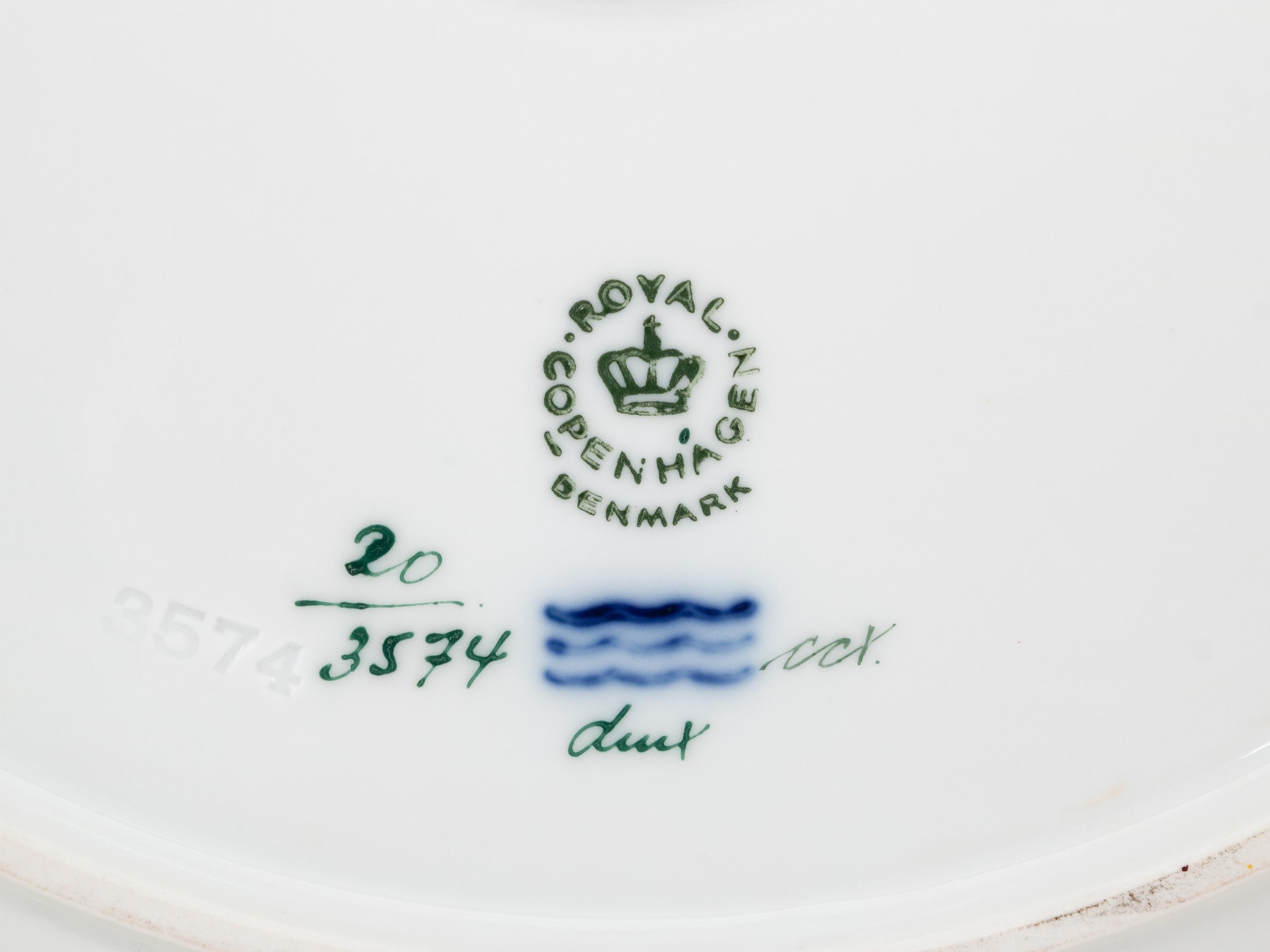 A Set of Fourteen Royal Copenhagen Flora Danica Dinner Plates