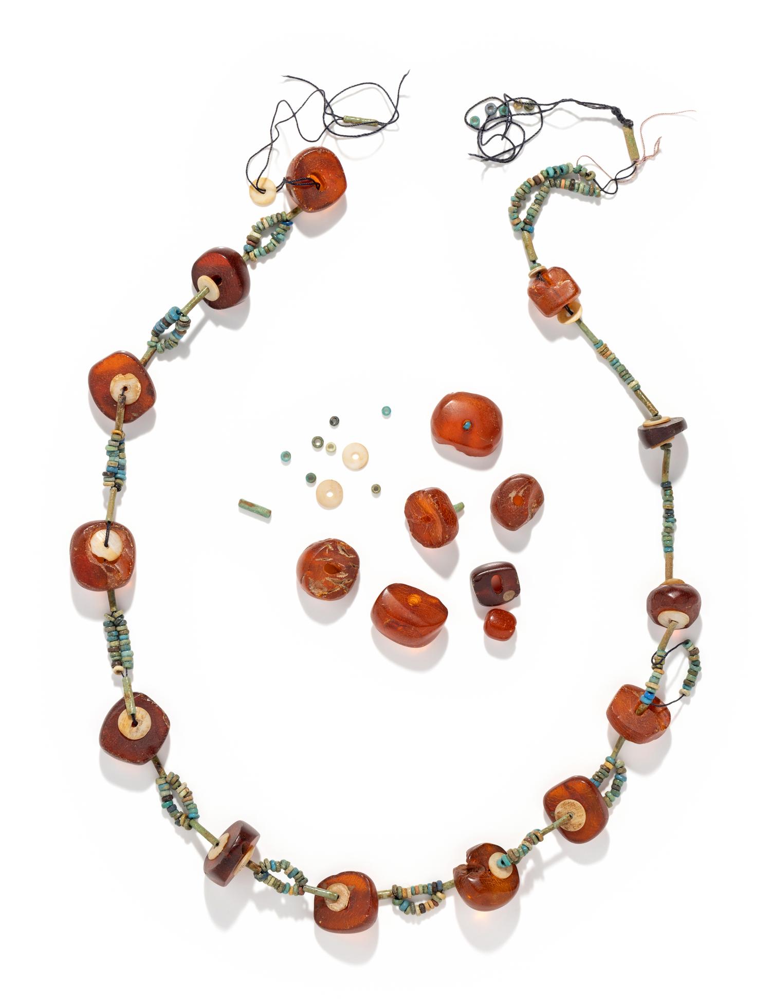 An Egyptian Amber and Faience Bead Necklace