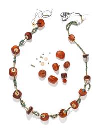 An Egyptian Amber and Faience Bead Necklace