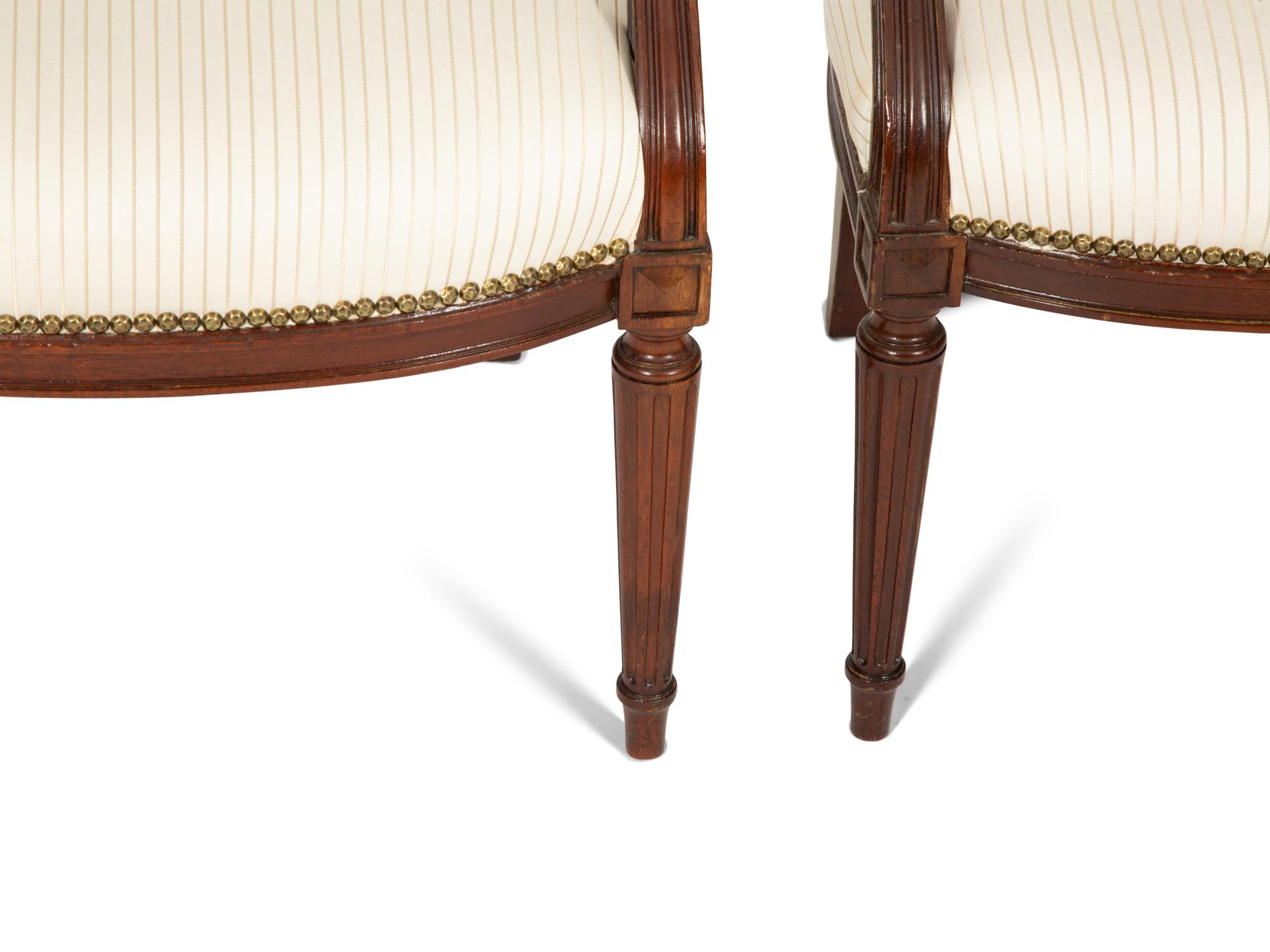 A Set of Six Louis XVI Style Mahogany Dining Armchairs