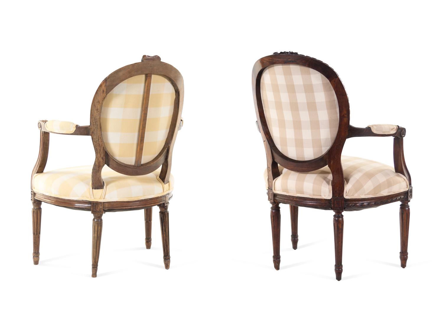 A Louis XVI Beechwood Fauteuil and a Louis XVI Style Walnut Fauteuil