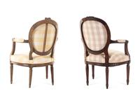 A Louis XVI Beechwood Fauteuil and a Louis XVI Style Walnut Fauteuil