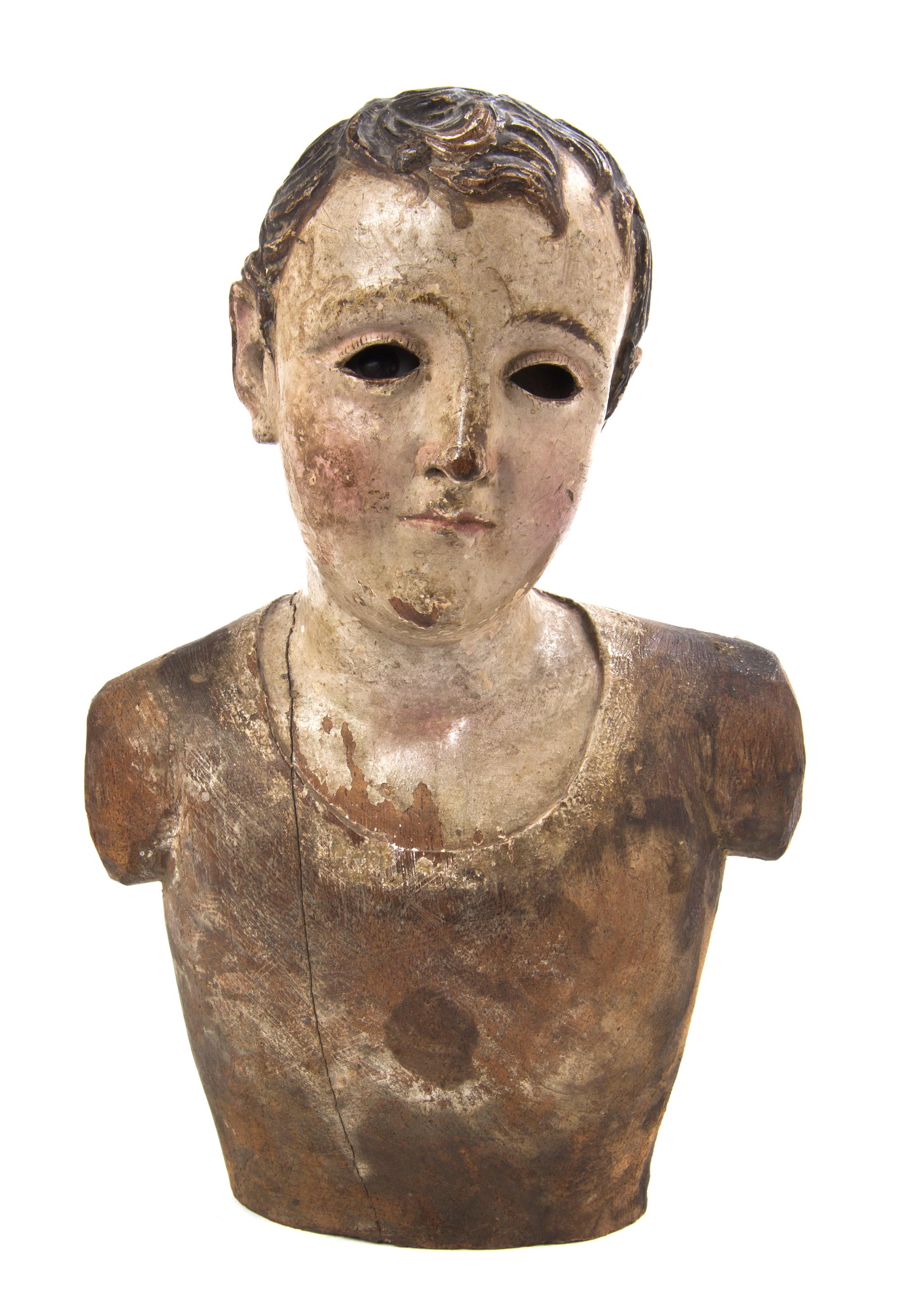 A Continental Carved and Polychrome Decorated Bust, Height 9 1/4 inches.