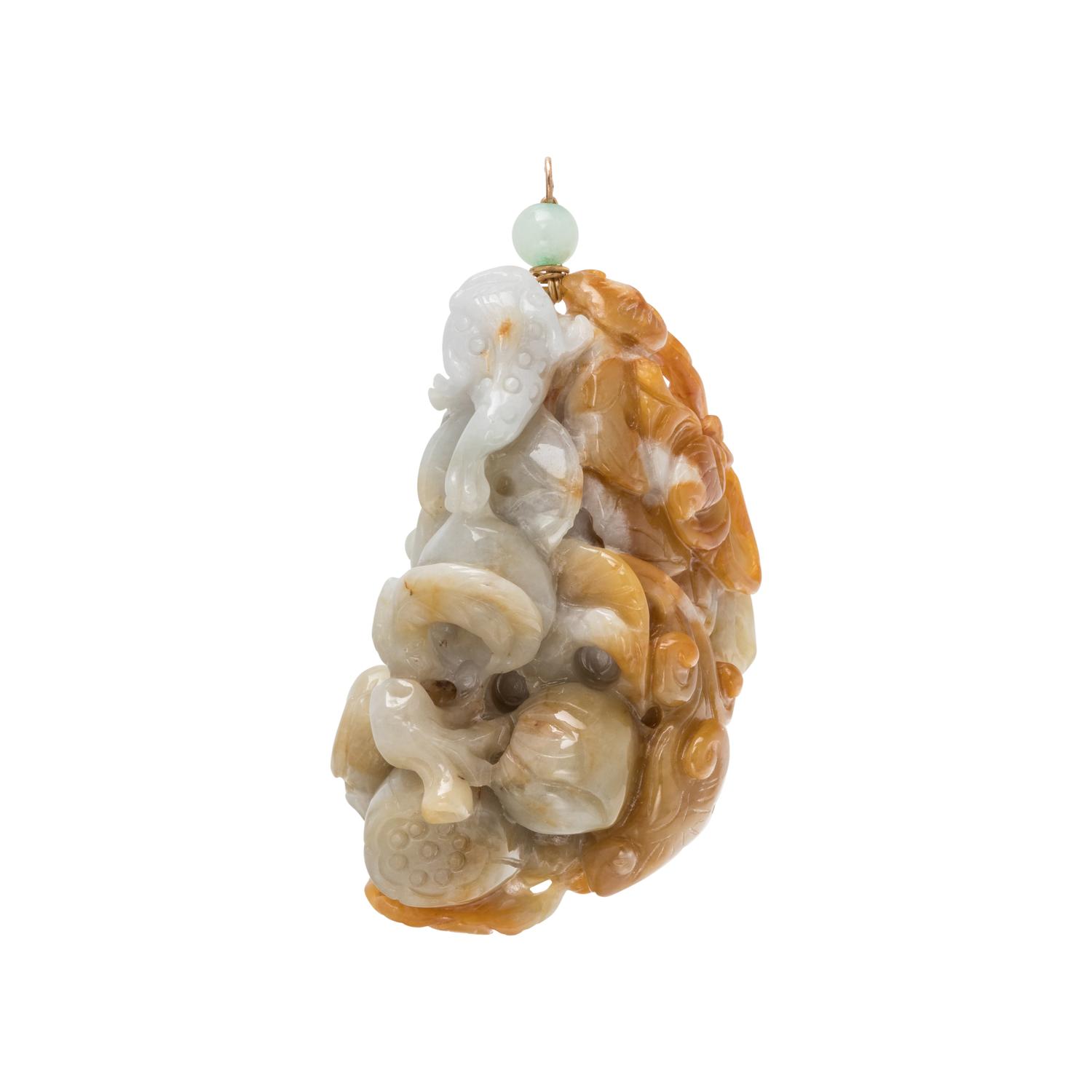 A Carved Jadeite Pendant