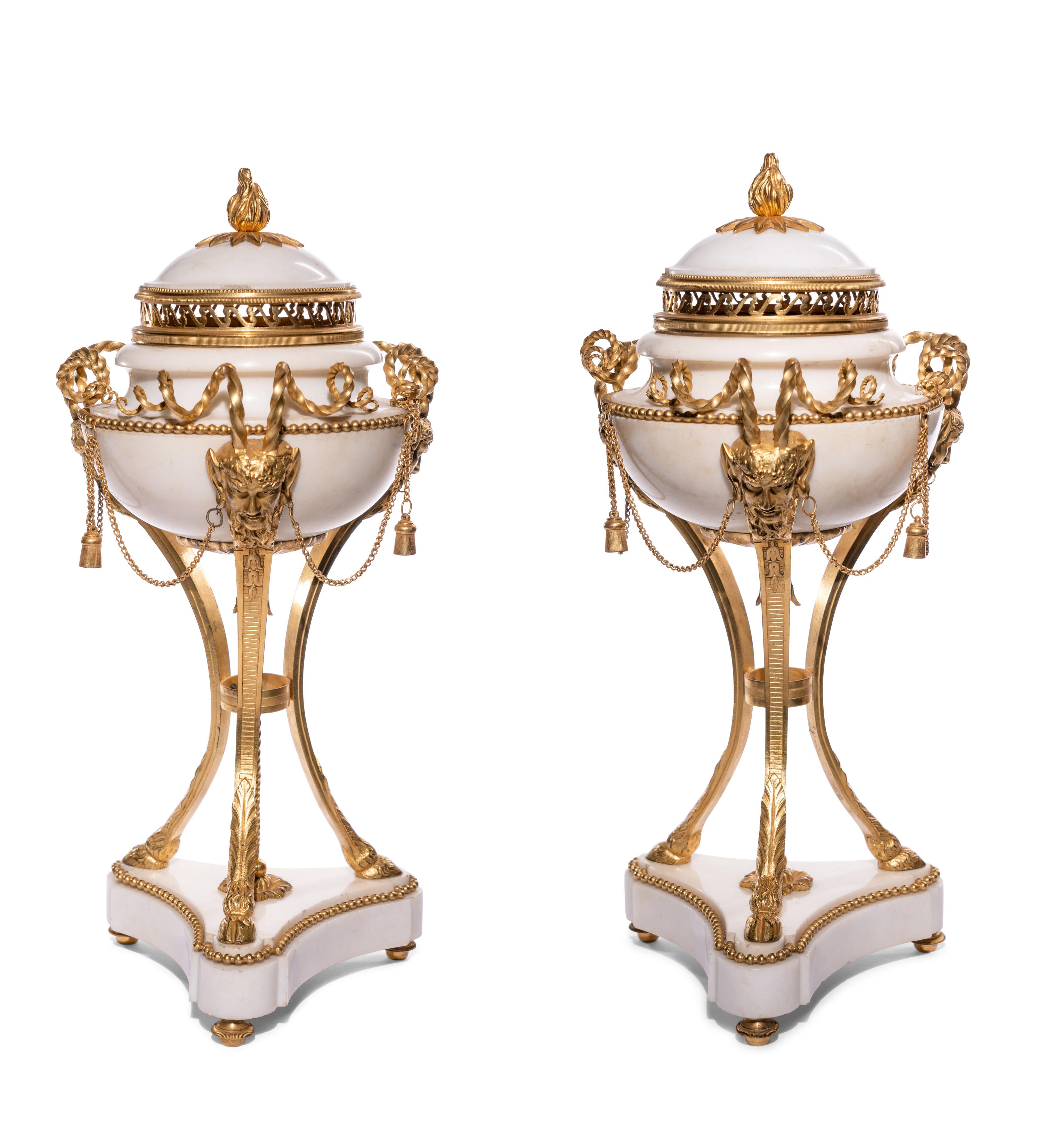 A Pair of Late Louis XVI Gilt Bronze Mounted White Marble Cassolettes
