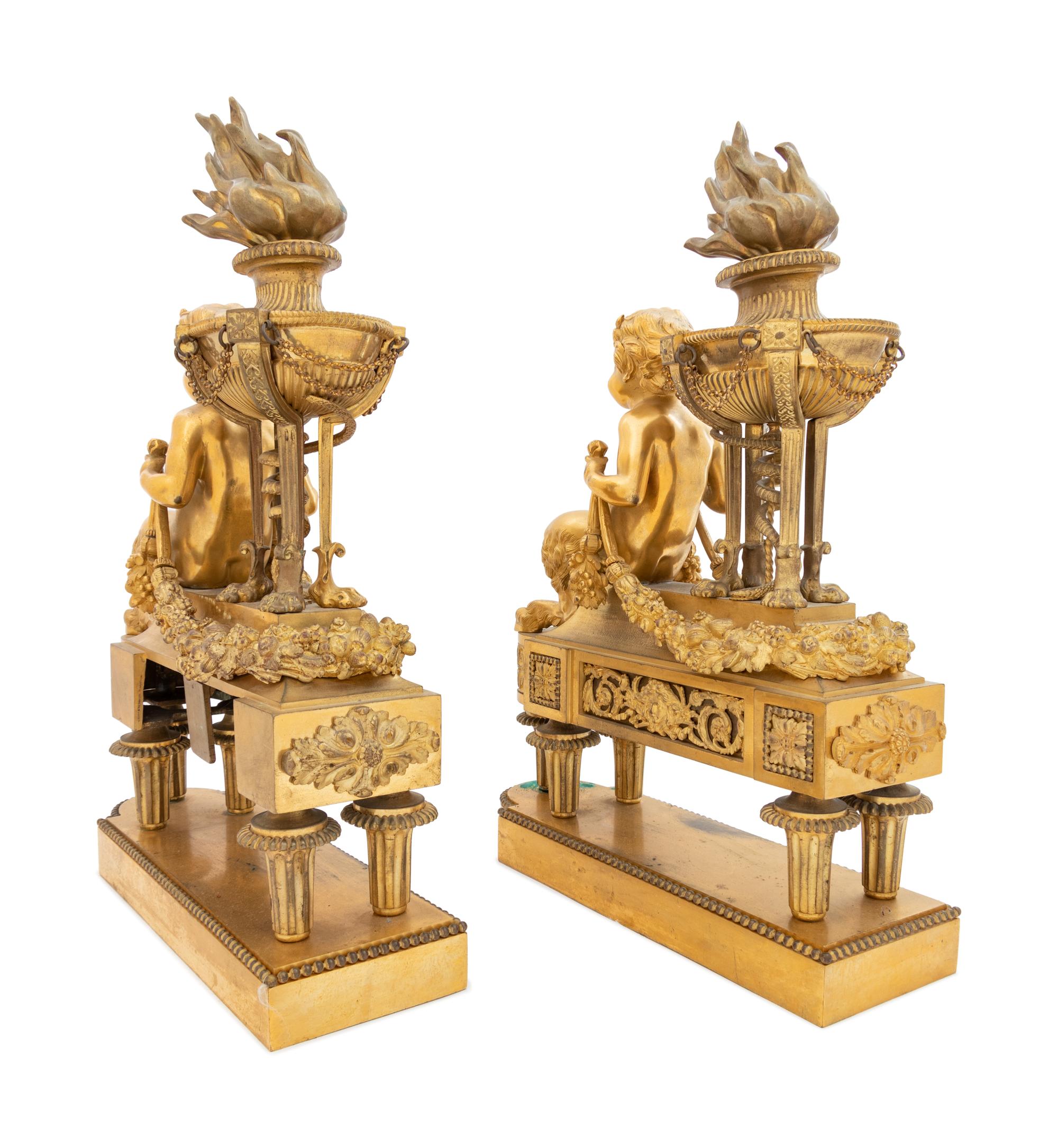 A Pair of Louis XVI Style Gilt Bronze Figural Chenets