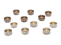 Eighteen American Silver Salt Cellars and Twelve Associated Silver Salt Spoons