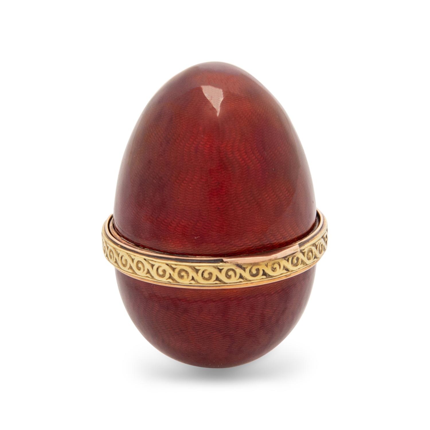 A Gold and Guilloché Enamel Egg-Form Snuff Box
