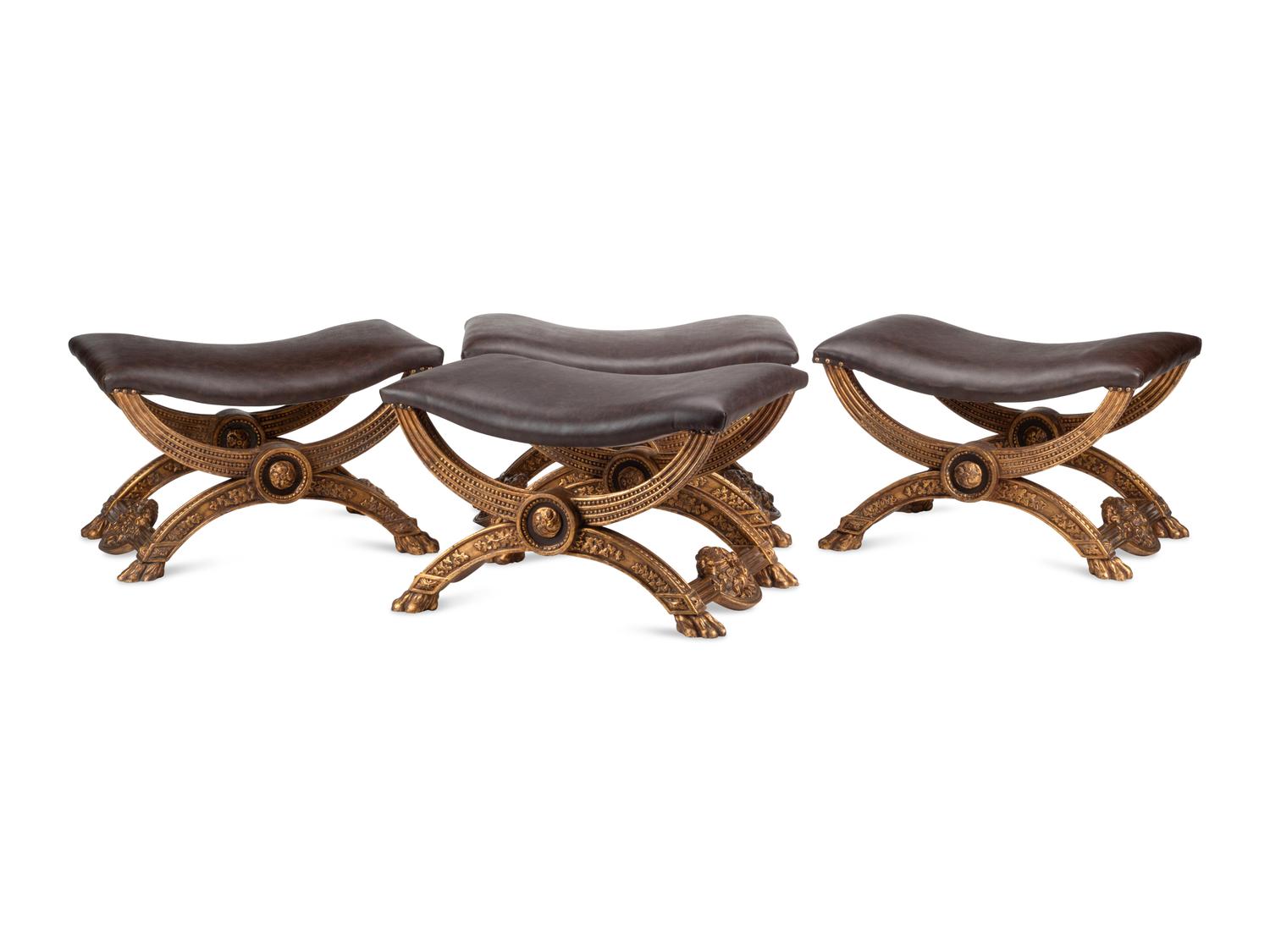 A Set of Four Italian Neoclassical Style Giltwood Benches with Leather Upholstery