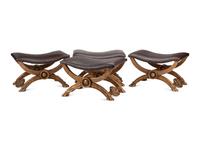 A Set of Four Italian Neoclassical Style Giltwood Benches with Leather Upholstery