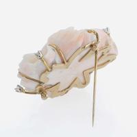 A Carved Coral, Diamond, and 14K Yellow Gold Brooch