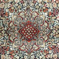 A Silk Tabriz Rug