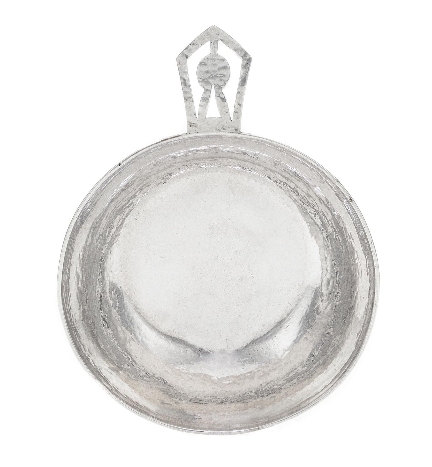 An American Silver Porringer, Edward Breese, Chicago, IL, 1920, the deep bowl having a flat handle with pierced geometric decoration an