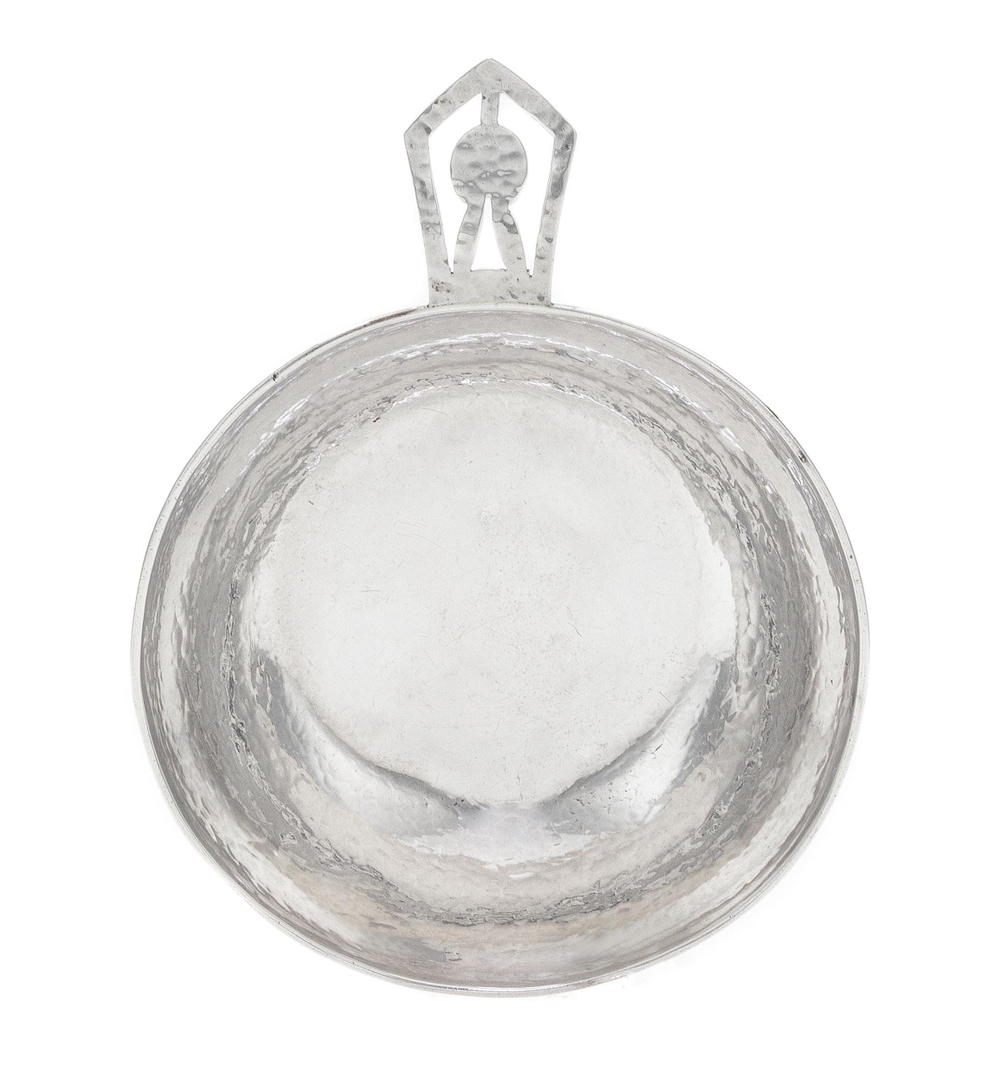 An American Silver Porringer, Edward Breese, Chicago, IL, 1920, the deep bowl having a flat handle with pierced geometric decoration an