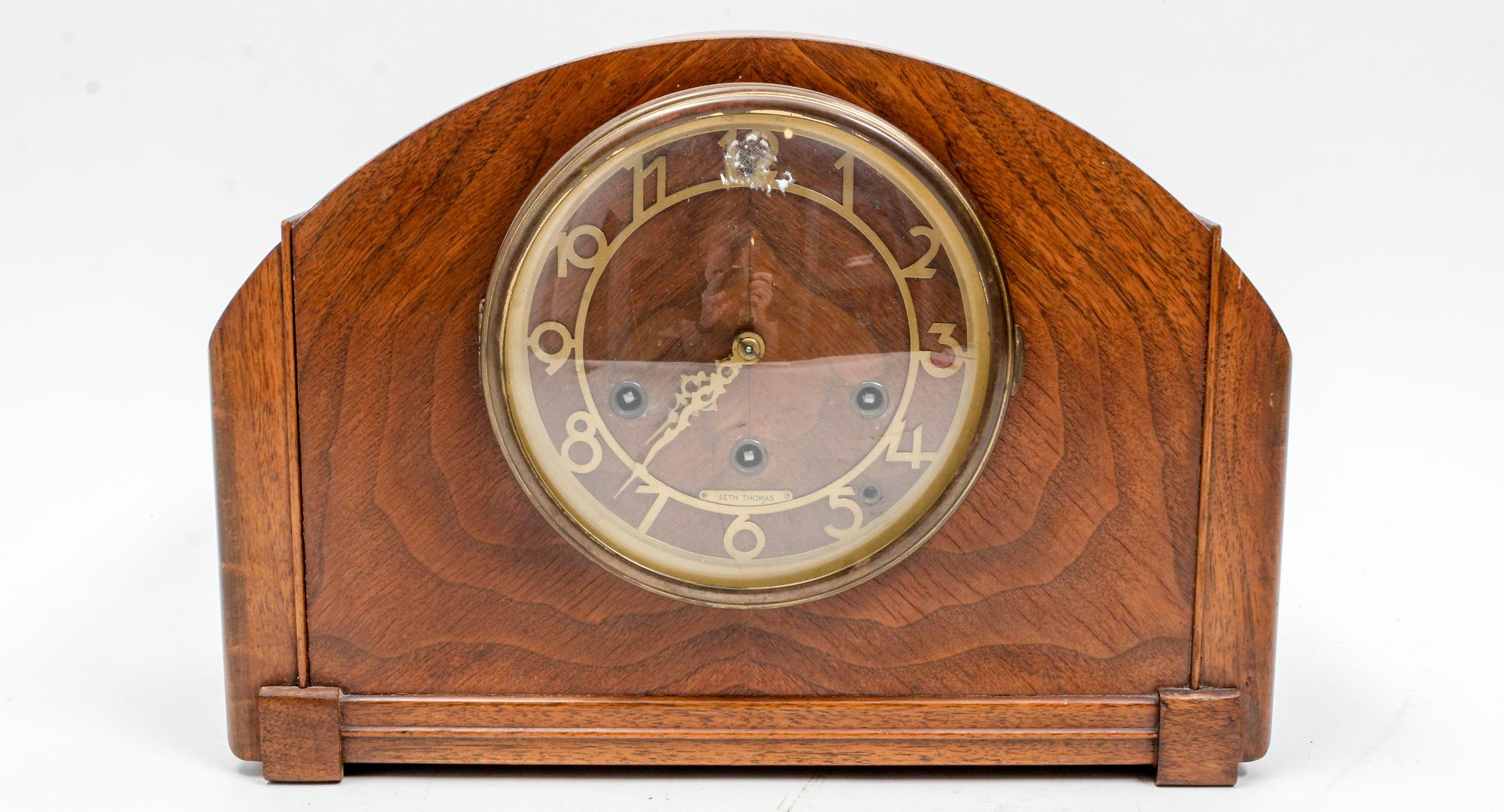 A Seth Thomas Mantel Clock Height 9 1/4 x width 13 inches.