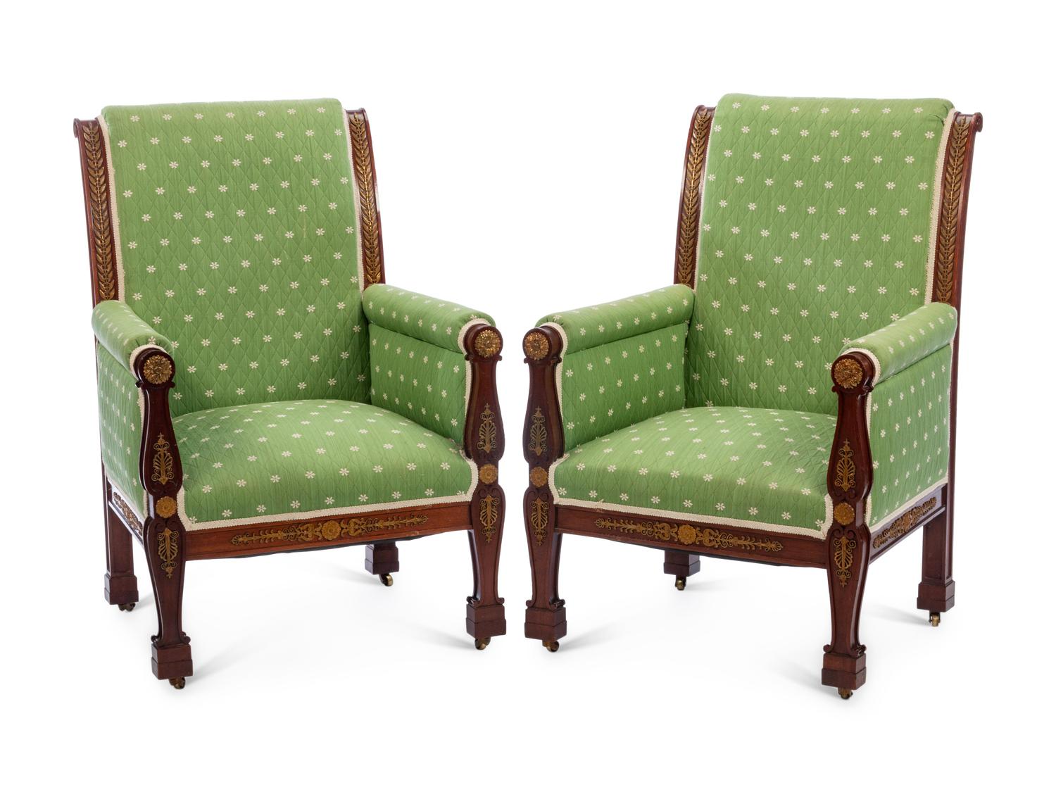 A Pair of Empire Style Gilt Bronze Mounted Mahogany Armchairs