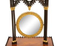 A Charles X Gothic-Motif Patinated, Gilt Bronze and Satinwood Dressing Mirror
