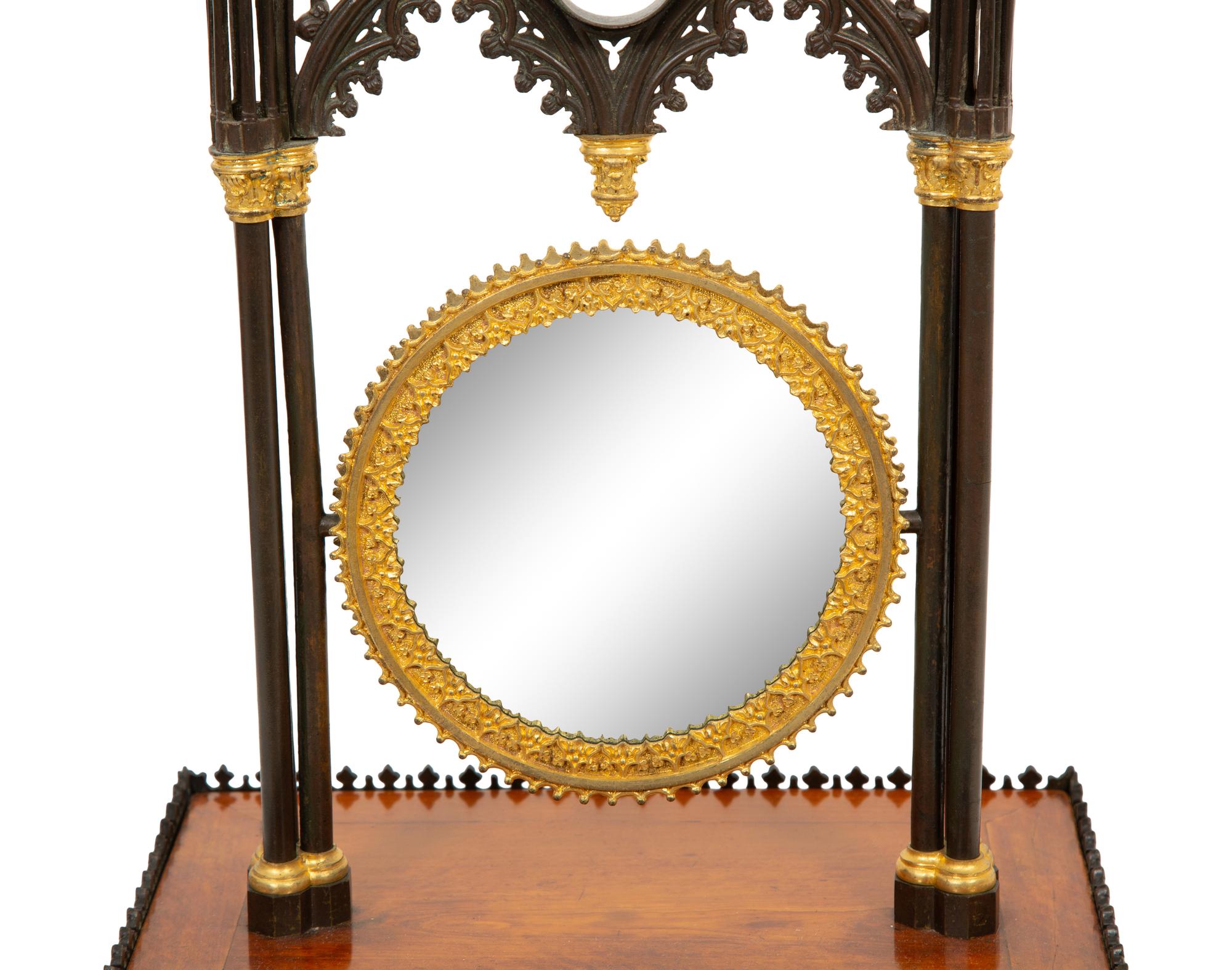 A Charles X Gothic-Motif Patinated, Gilt Bronze and Satinwood Dressing Mirror