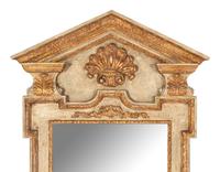 An Italian Painted and Parcel Gilt Mirror