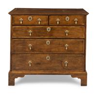 A George II Walnut and Mahogany Chest of Drawers