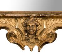 An Italian Rococo Carved Giltwood Mirror