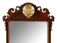 A George III Parcel-Gilt Mahogany Mirror