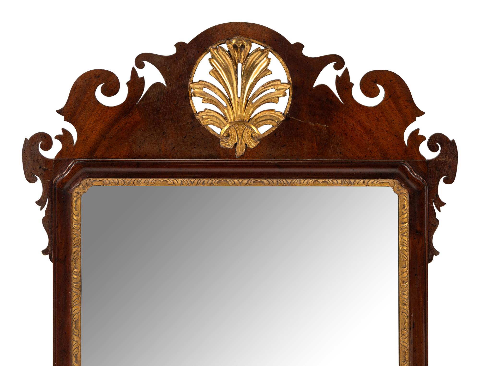 A George III Parcel-Gilt Mahogany Mirror