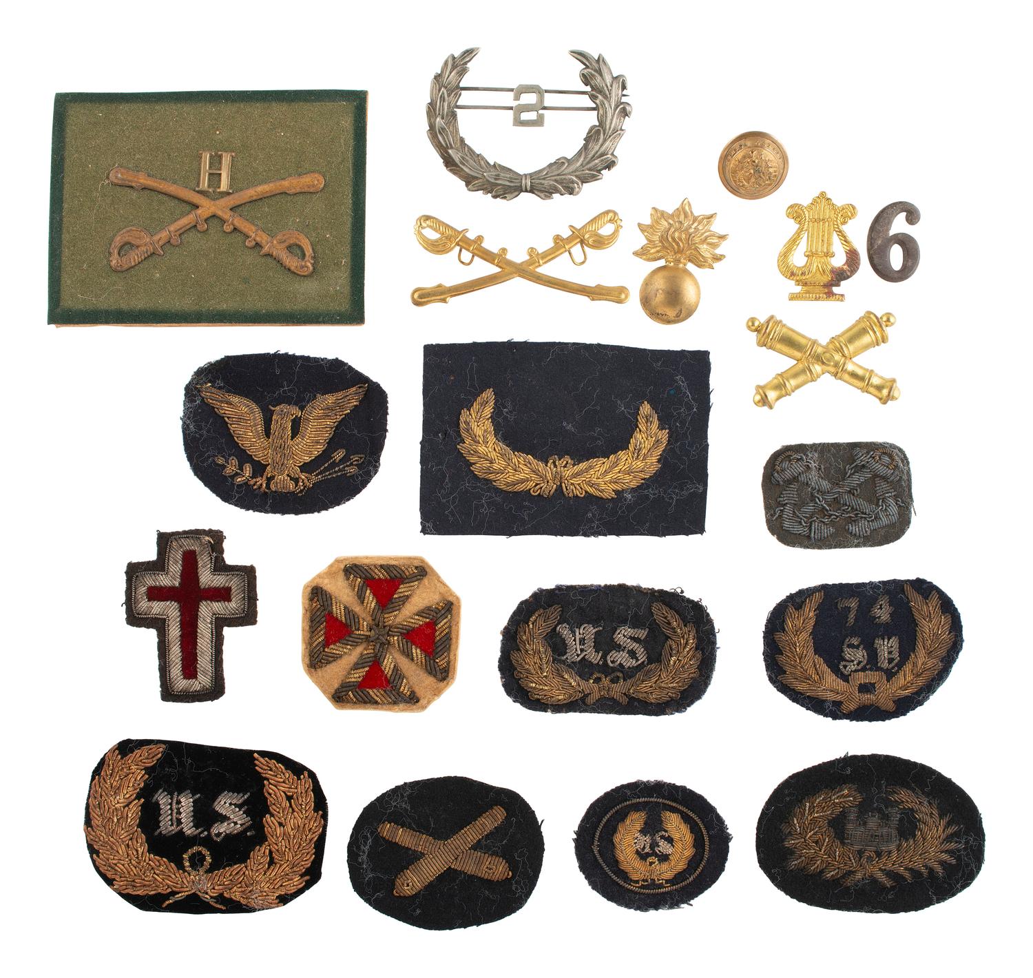 [MILITARIA] Collection of military insignia and cap devices from the Estate of Carroll J. Delery III