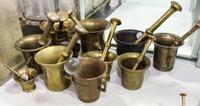 Eleven Brass Mortars and Pestles. Height of tallest 5 1/4 inches.