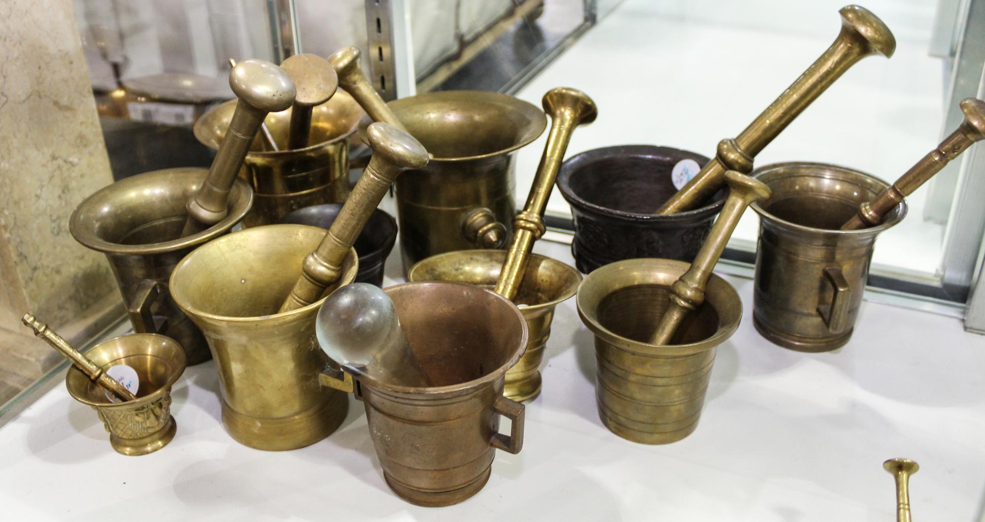 Eleven Brass Mortars and Pestles. Height of tallest 5 1/4 inches.
