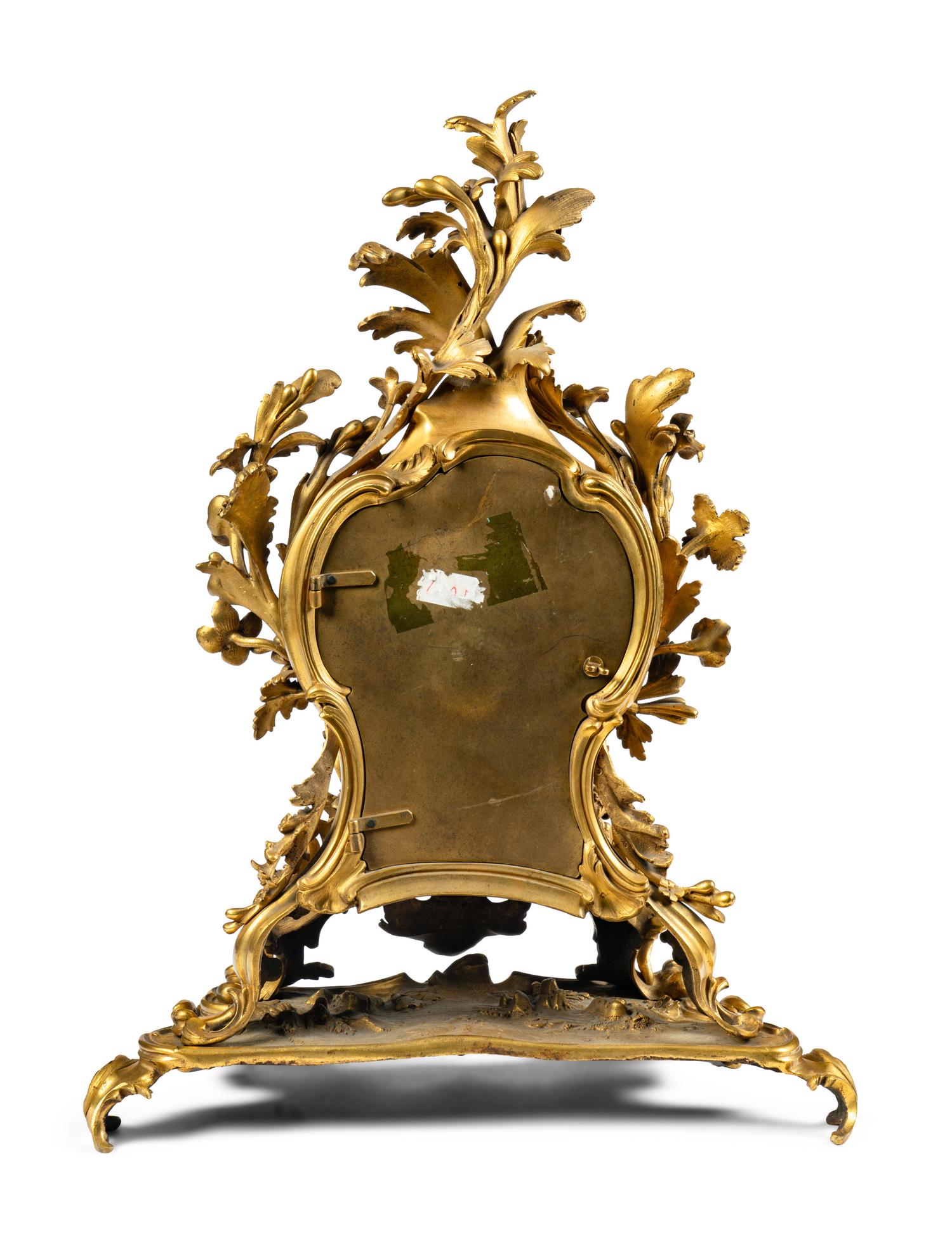 A Louis XV Gilt Bronze Mantel Clock