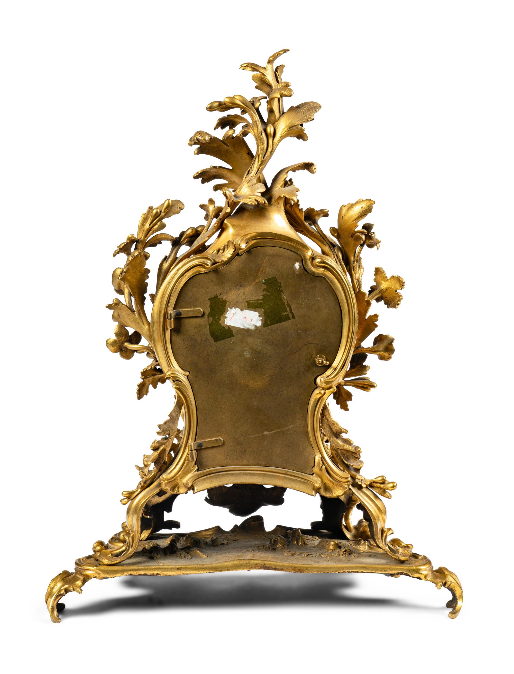 A Louis XV Gilt Bronze Mantel Clock