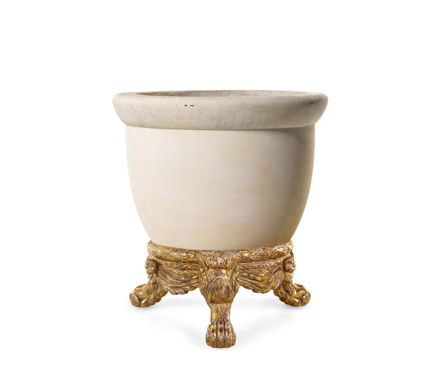 A Cast Stone Jardinière with an Italian Baroque Style Giltwood Base