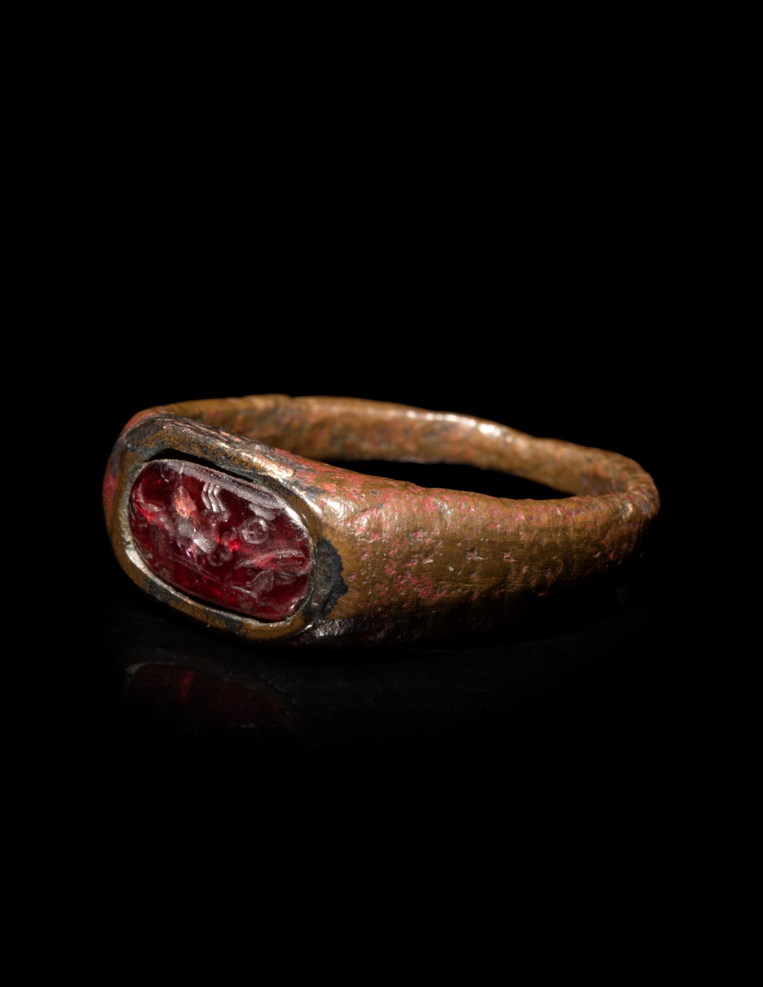 A Roman Bronze and Carnelian Finger Ring