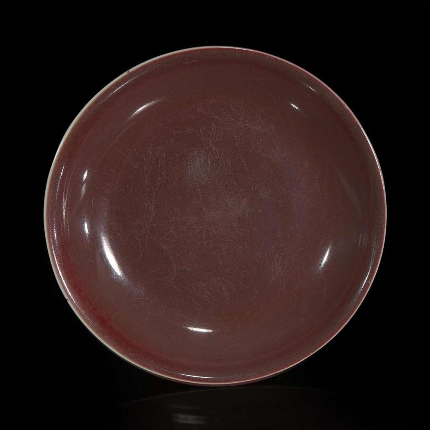 A Chinese copper-red glazed dish 釉里红碟子 Xuande incised six-character mark ???????