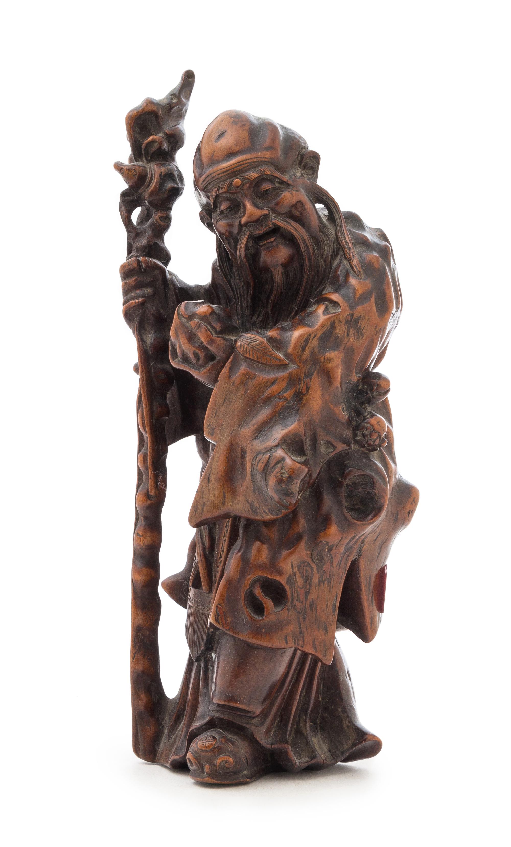 A Carved Wood Figure of Shoulao Height 10 1/2 inches.