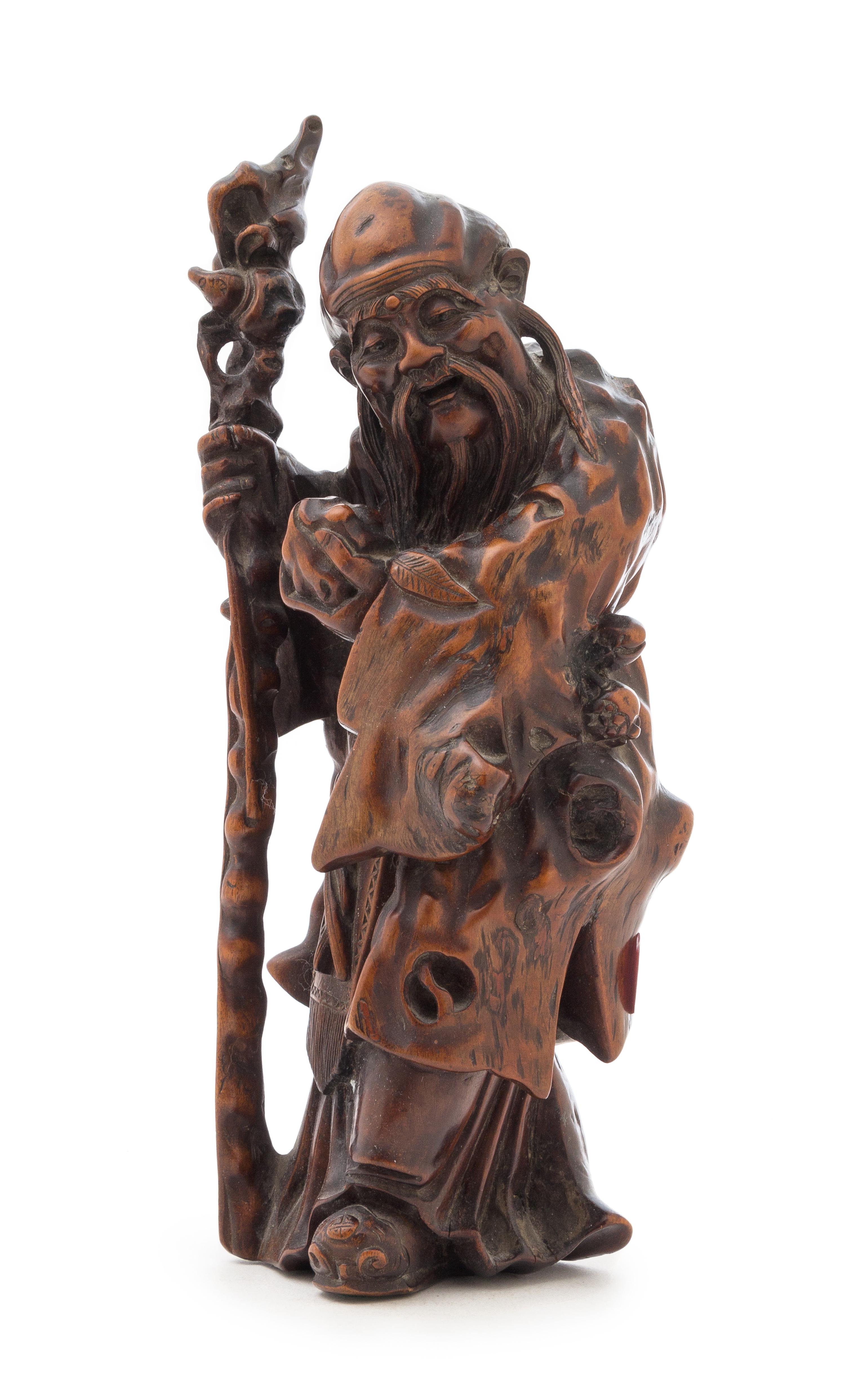 A Carved Wood Figure of Shoulao Height 10 1/2 inches.