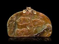 A Celadon and Russet Jade Pendant
