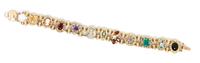 A 10 Karat Yellow Gold and Gemstone Slide Bracelet, 16.40 dwts.
