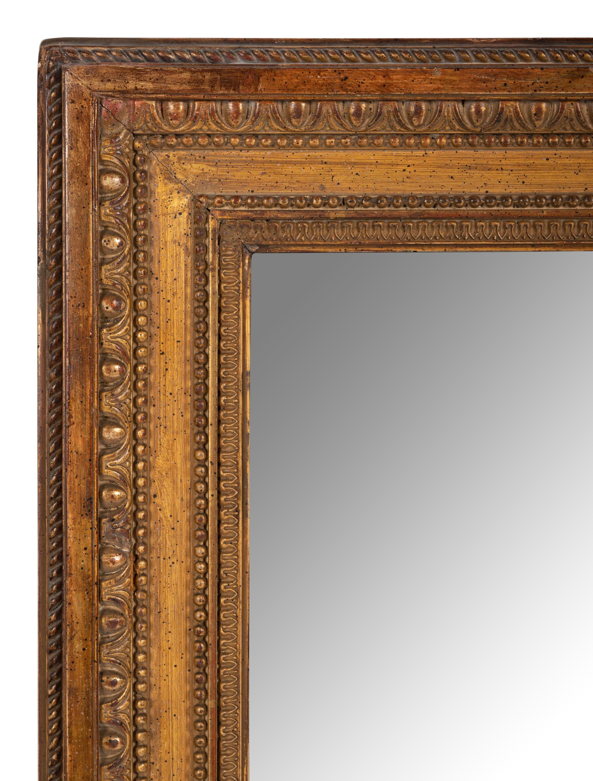 A Neoclassical Style Giltwood Mirror