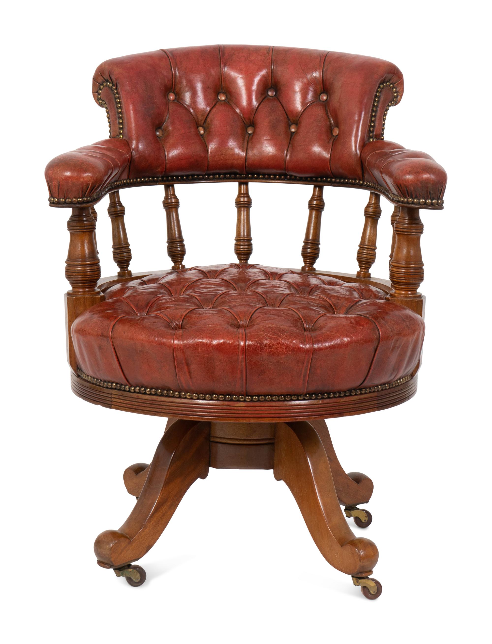 A George III Style Walnut Swivel Desk Chair — EARLY 19TH CENTURY