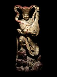 A Set of Four Gilt and Red Lacquered Wood Figures of Guardians