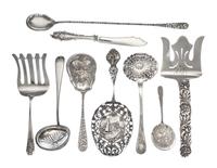 A Group of Silver Serving Articles, Various Makers, comprising two asparagus forks, two berry spoons, two bon bon spoons, two fish kniv