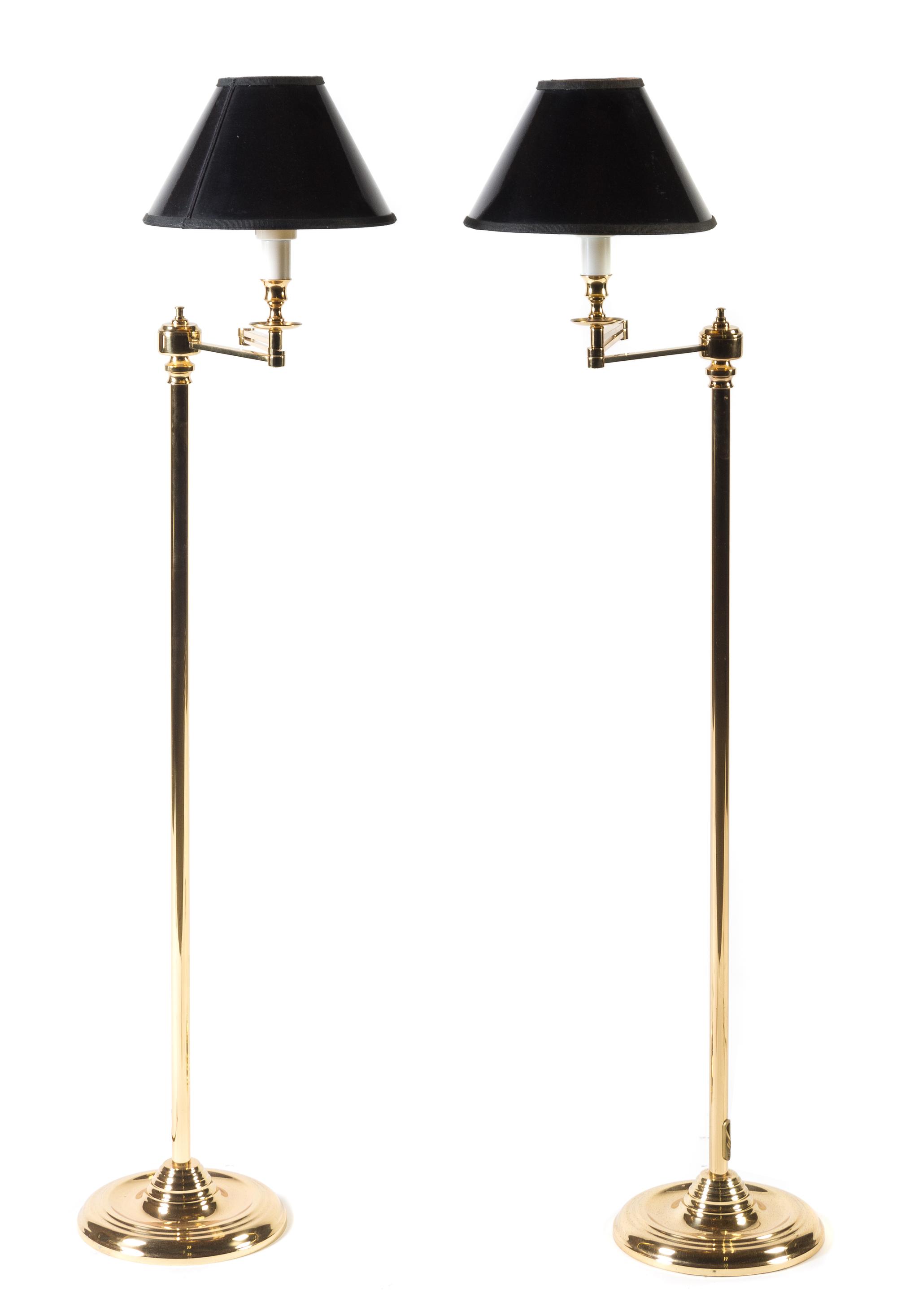 A Pair of Brass Swing-Arm Floor Lamps Height overall 48 1/2 inches. — 20TH CENTURY