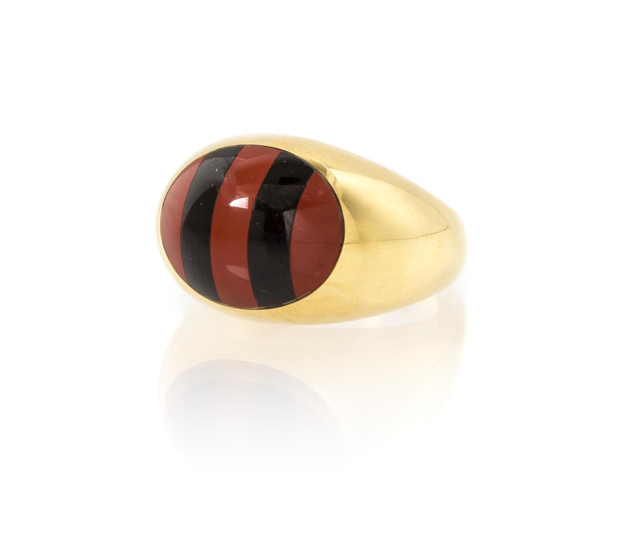 An 18 Karat Yellow Gold, Onyx and Carnelian Bombe Ring, Tiffany & Co., 4.90 dwts.